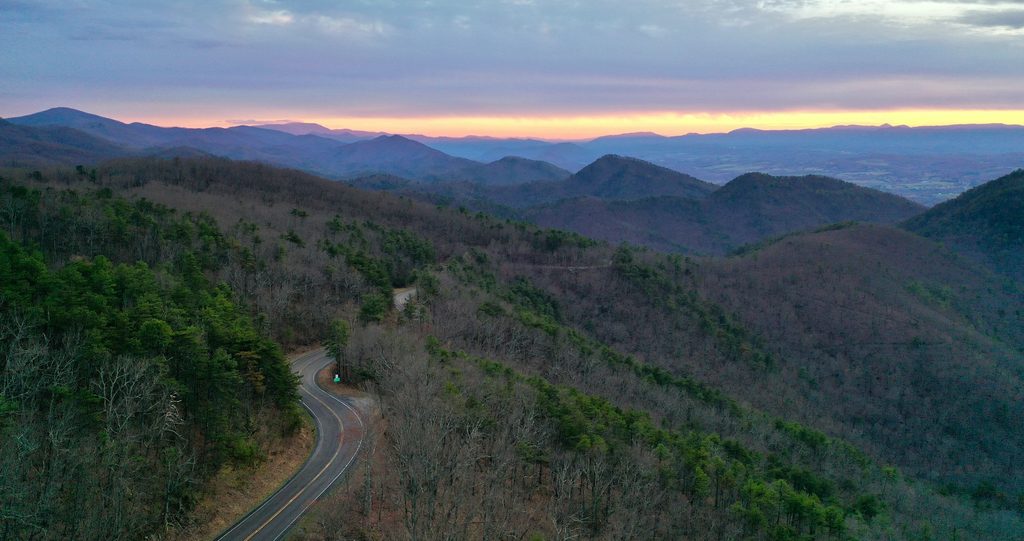 view of a road going through the mountains